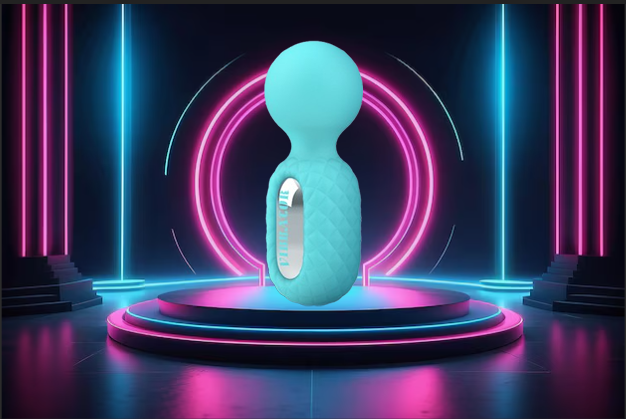 Teal vibrator with a curved ergonomic shape displayed against a peachy-pink background, featuring a minimalist design for discreet pleasure and intimate wellness.